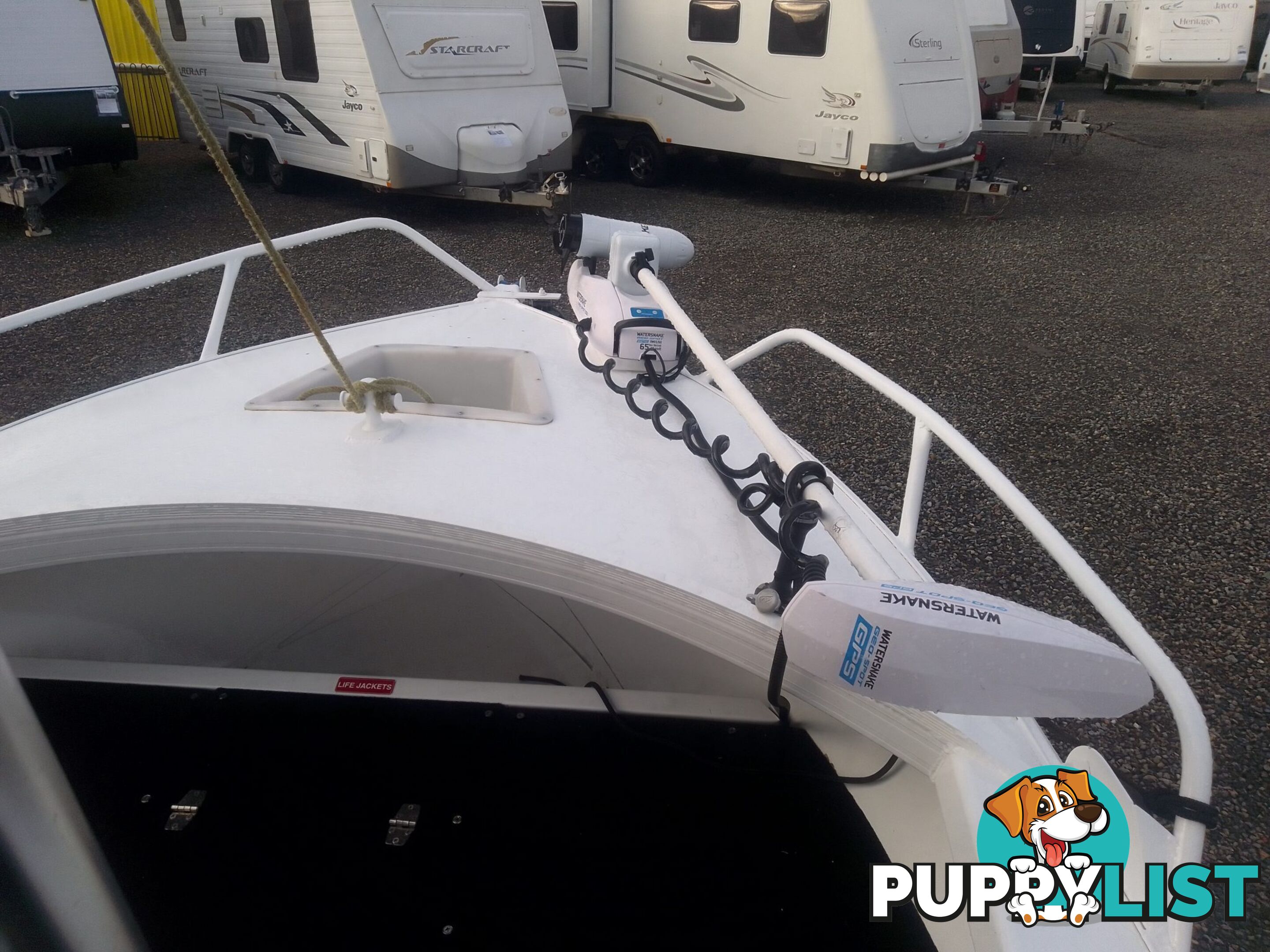 USED 2011 BROOKER DISCOVERY 5M CENTRE CONSOLE WITH A 2007 75HP MERCURY EFI 4 STROKE OUTBOARD ON A 2002 QUINTREX SINGLE AXLE TRAILER.