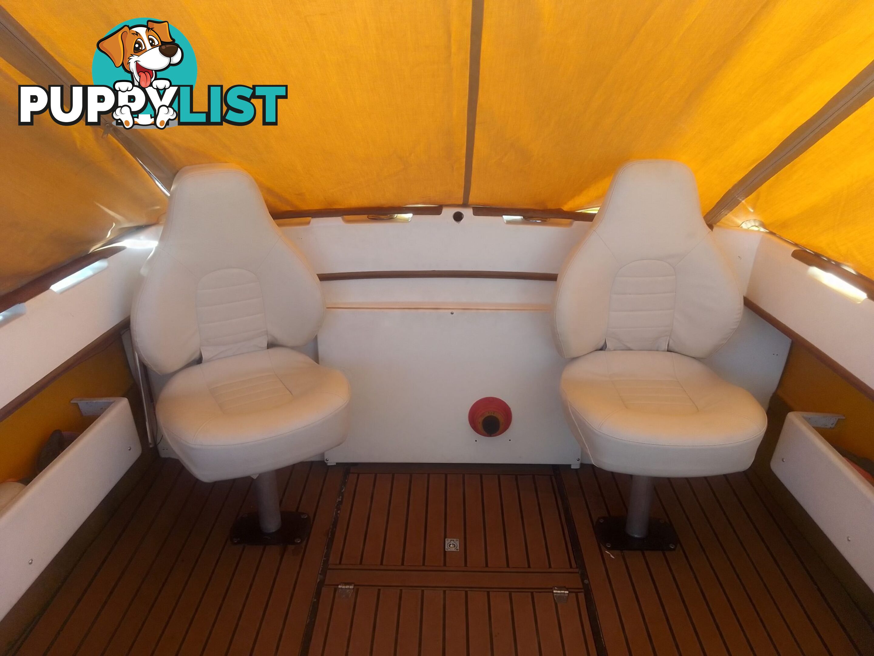 USED 1989 SMUGGLER 6.30 HALF CABIN WITH A 225HP V6 EVINRUDE OUTBOARD ON A 2000 MODEL DUAL AXLE TRAILER.