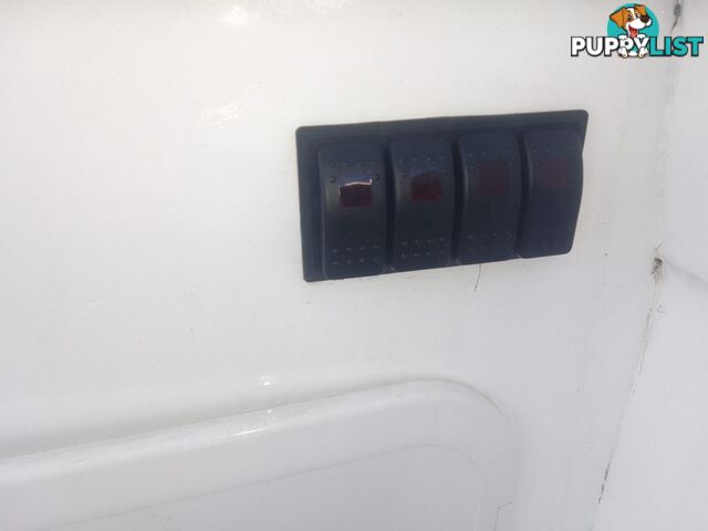 USED 1985 SWIFT CRAFT 7.1M HALF CABIN WTH A 6 CYLINDER MERCRUISER INBOARD DIESEL ENGINE ON A CUSTOM DUAL AXLE TRAILER