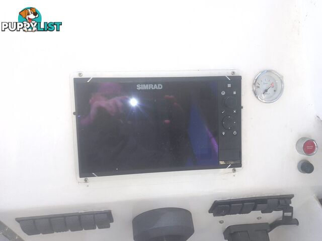 USED 1985 SWIFT CRAFT 7.1M HALF CABIN WTH A 6 CYLINDER MERCRUISER INBOARD DIESEL ENGINE ON A CUSTOM DUAL AXLE TRAILER