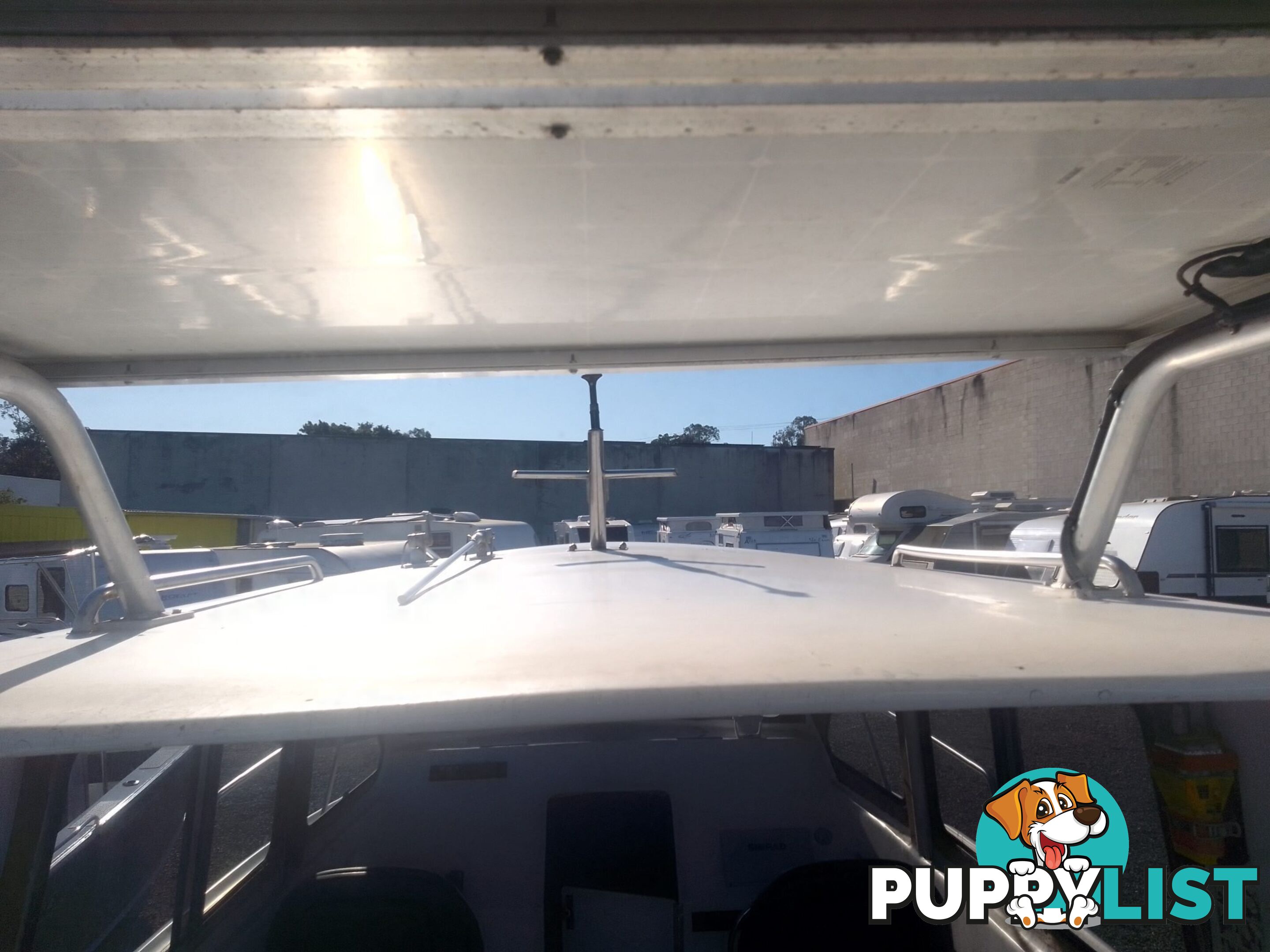 USED 1985 SWIFT CRAFT 7.1M HALF CABIN WTH A 6 CYLINDER MERCRUISER INBOARD DIESEL ENGINE ON A CUSTOM DUAL AXLE TRAILER