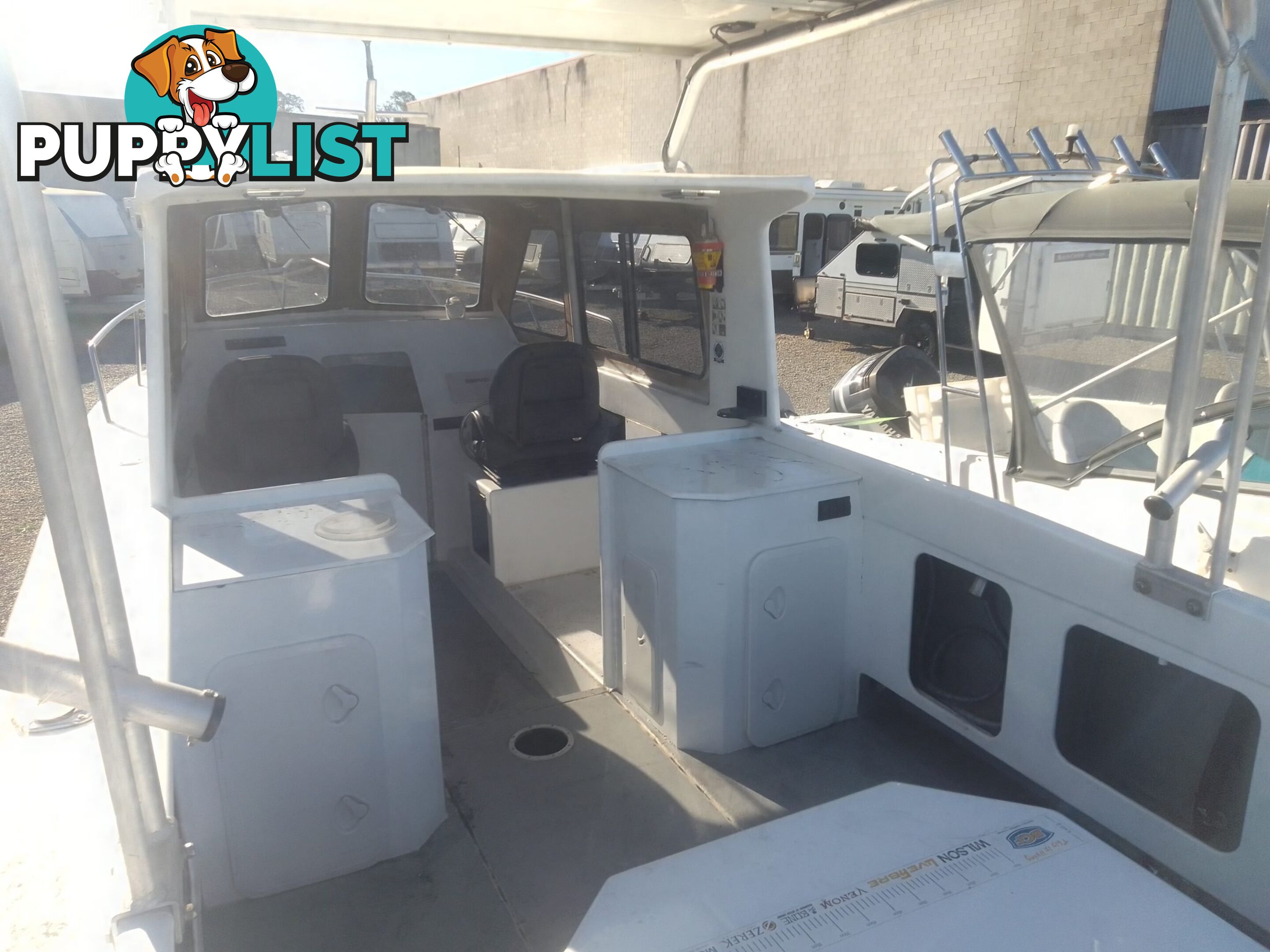 USED 1985 SWIFT CRAFT 7.1M HALF CABIN WTH A 6 CYLINDER MERCRUISER INBOARD DIESEL ENGINE ON A CUSTOM DUAL AXLE TRAILER