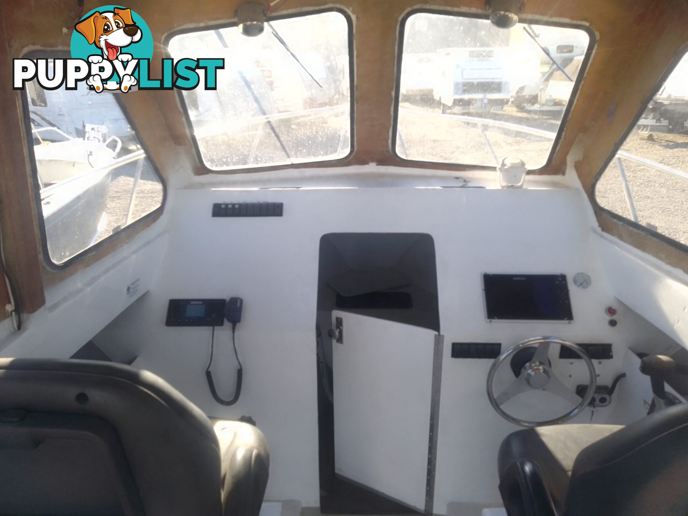 USED 1985 SWIFT CRAFT 7.1M HALF CABIN WTH A 6 CYLINDER MERCRUISER INBOARD DIESEL ENGINE ON A CUSTOM DUAL AXLE TRAILER