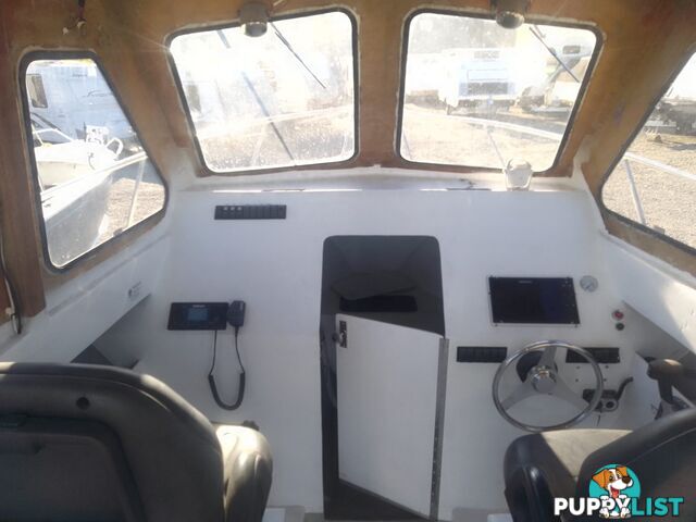 USED 1985 SWIFT CRAFT 7.1M HALF CABIN WTH A 6 CYLINDER MERCRUISER INBOARD DIESEL ENGINE ON A CUSTOM DUAL AXLE TRAILER