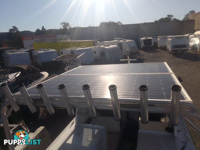 USED 1985 SWIFT CRAFT 7.1M HALF CABIN WTH A 6 CYLINDER MERCRUISER INBOARD DIESEL ENGINE ON A CUSTOM DUAL AXLE TRAILER