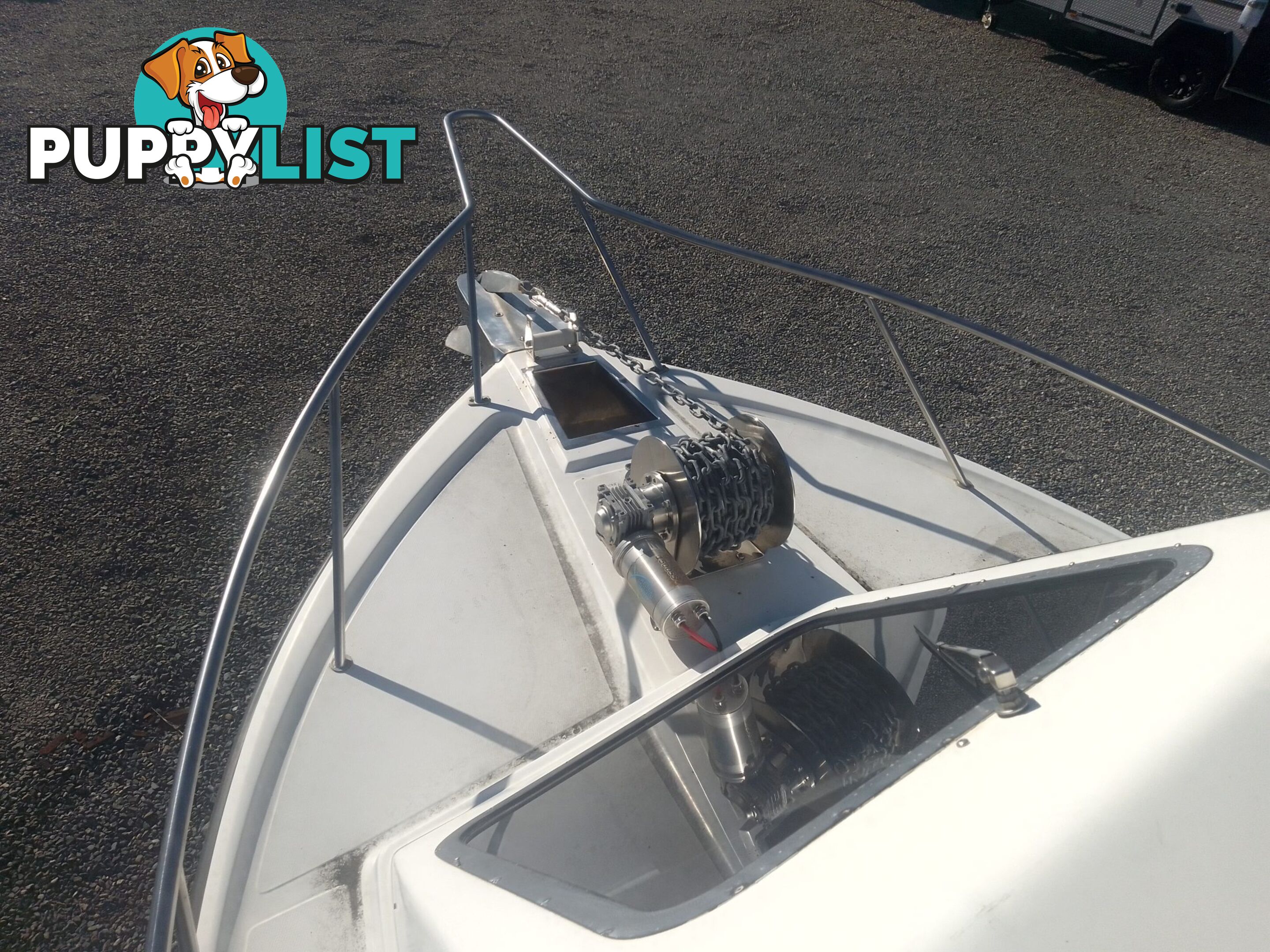 USED 1985 SWIFT CRAFT 7.1M HALF CABIN WTH A 6 CYLINDER MERCRUISER INBOARD DIESEL ENGINE ON A CUSTOM DUAL AXLE TRAILER