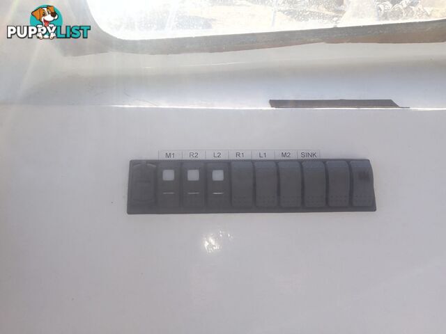 USED 1985 SWIFT CRAFT 7.1M HALF CABIN WTH A 6 CYLINDER MERCRUISER INBOARD DIESEL ENGINE ON A CUSTOM DUAL AXLE TRAILER