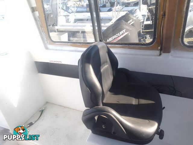 USED 1985 SWIFT CRAFT 7.1M HALF CABIN WTH A 6 CYLINDER MERCRUISER INBOARD DIESEL ENGINE ON A CUSTOM DUAL AXLE TRAILER