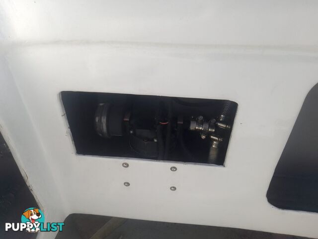 USED 1985 SWIFT CRAFT 7.1M HALF CABIN WTH A 6 CYLINDER MERCRUISER INBOARD DIESEL ENGINE ON A CUSTOM DUAL AXLE TRAILER