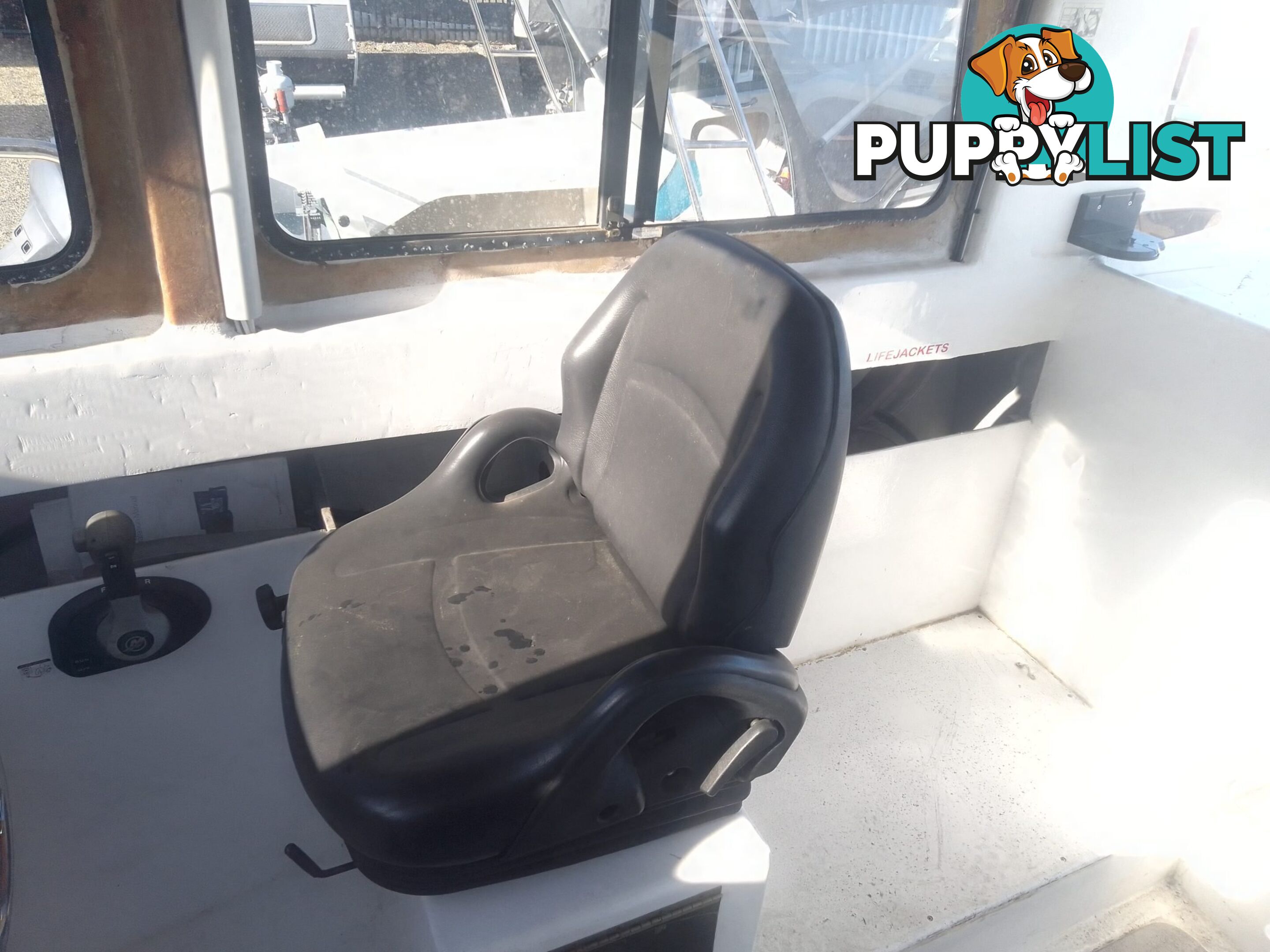 USED 1985 SWIFT CRAFT 7.1M HALF CABIN WTH A 6 CYLINDER MERCRUISER INBOARD DIESEL ENGINE ON A CUSTOM DUAL AXLE TRAILER