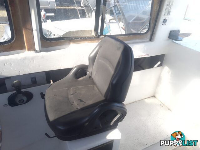 USED 1985 SWIFT CRAFT 7.1M HALF CABIN WTH A 6 CYLINDER MERCRUISER INBOARD DIESEL ENGINE ON A CUSTOM DUAL AXLE TRAILER