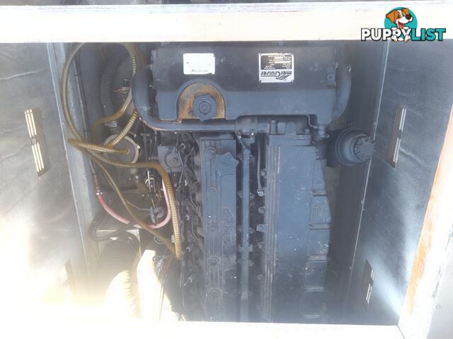 USED 1985 SWIFT CRAFT 7.1M HALF CABIN WTH A 6 CYLINDER MERCRUISER INBOARD DIESEL ENGINE ON A CUSTOM DUAL AXLE TRAILER