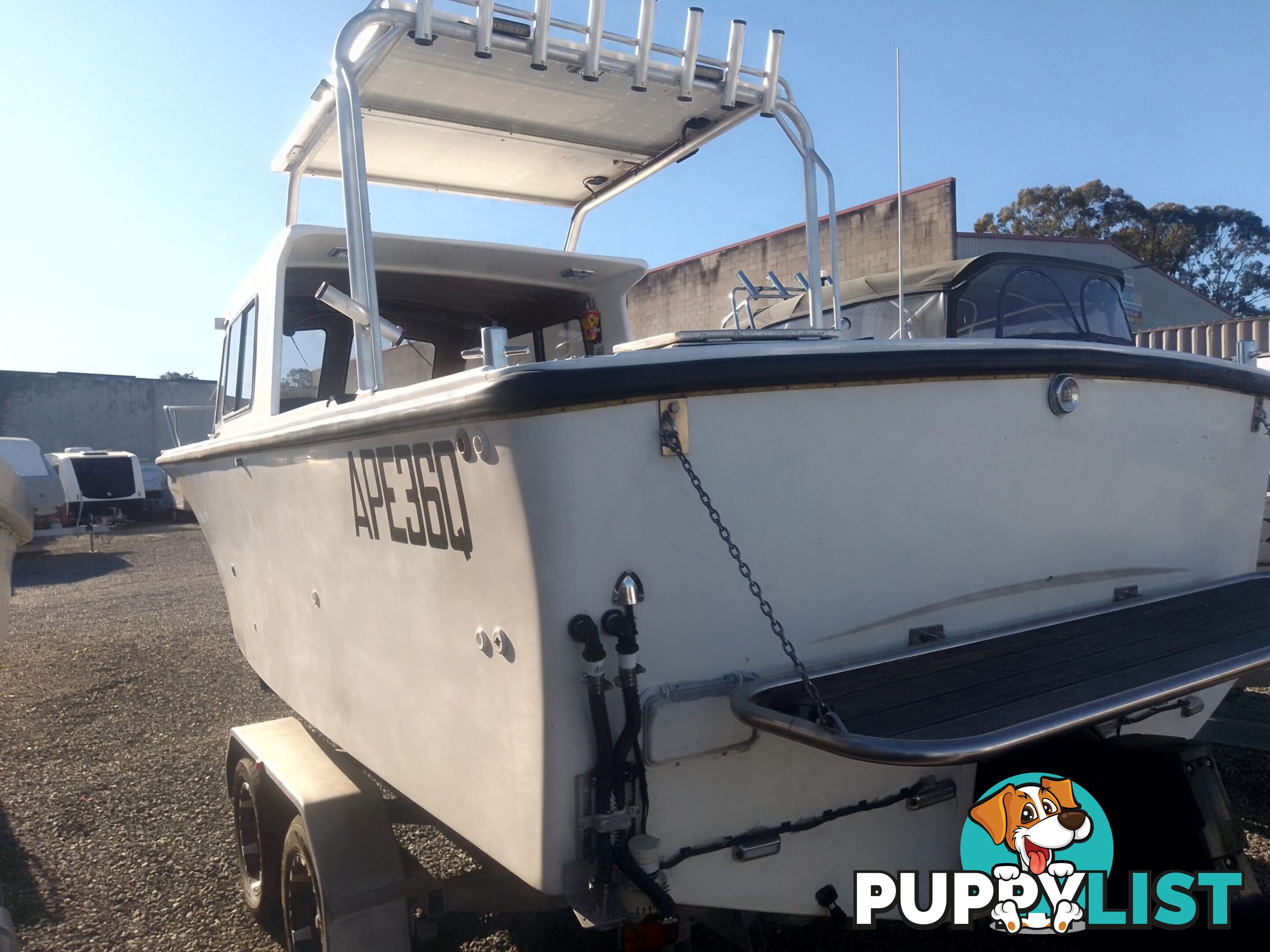 USED 1985 SWIFT CRAFT 7.1M HALF CABIN WTH A 6 CYLINDER MERCRUISER INBOARD DIESEL ENGINE ON A CUSTOM DUAL AXLE TRAILER