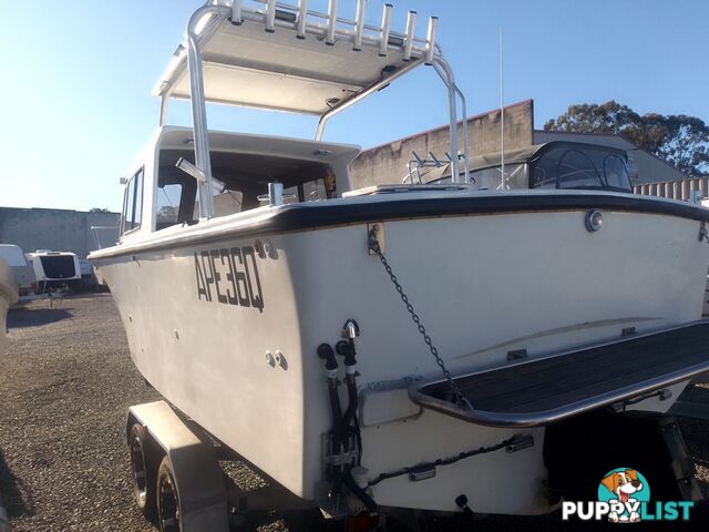 USED 1985 SWIFT CRAFT 7.1M HALF CABIN WTH A 6 CYLINDER MERCRUISER INBOARD DIESEL ENGINE ON A CUSTOM DUAL AXLE TRAILER