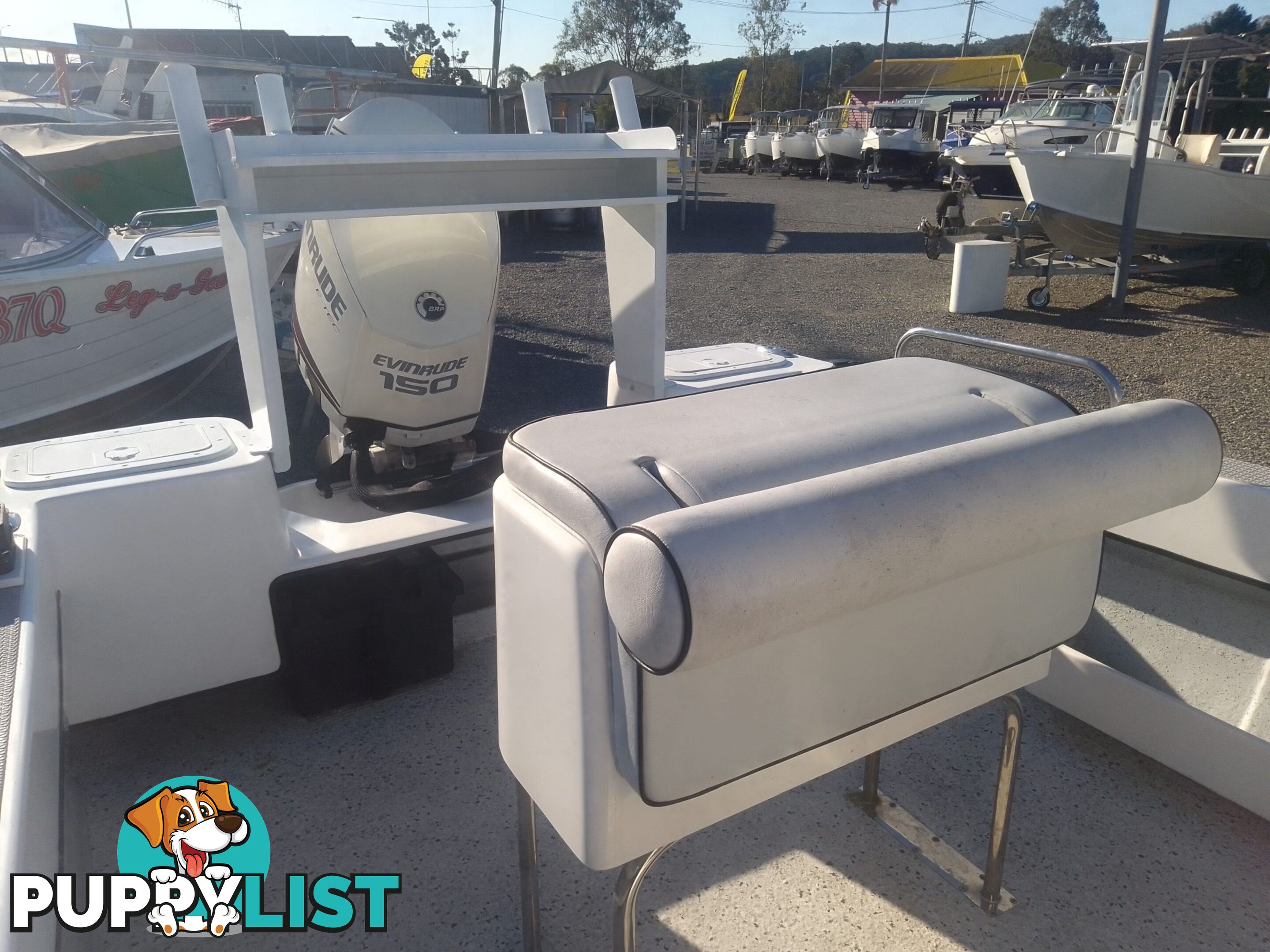 USED 2012 BONITO 560 CENTRE CONSOLE WITH A 2016 150HP EVINRUDE ETEC OUTBOARD ON A 2016 MAYFAIR MARINE DUAL AXLE TRAILER