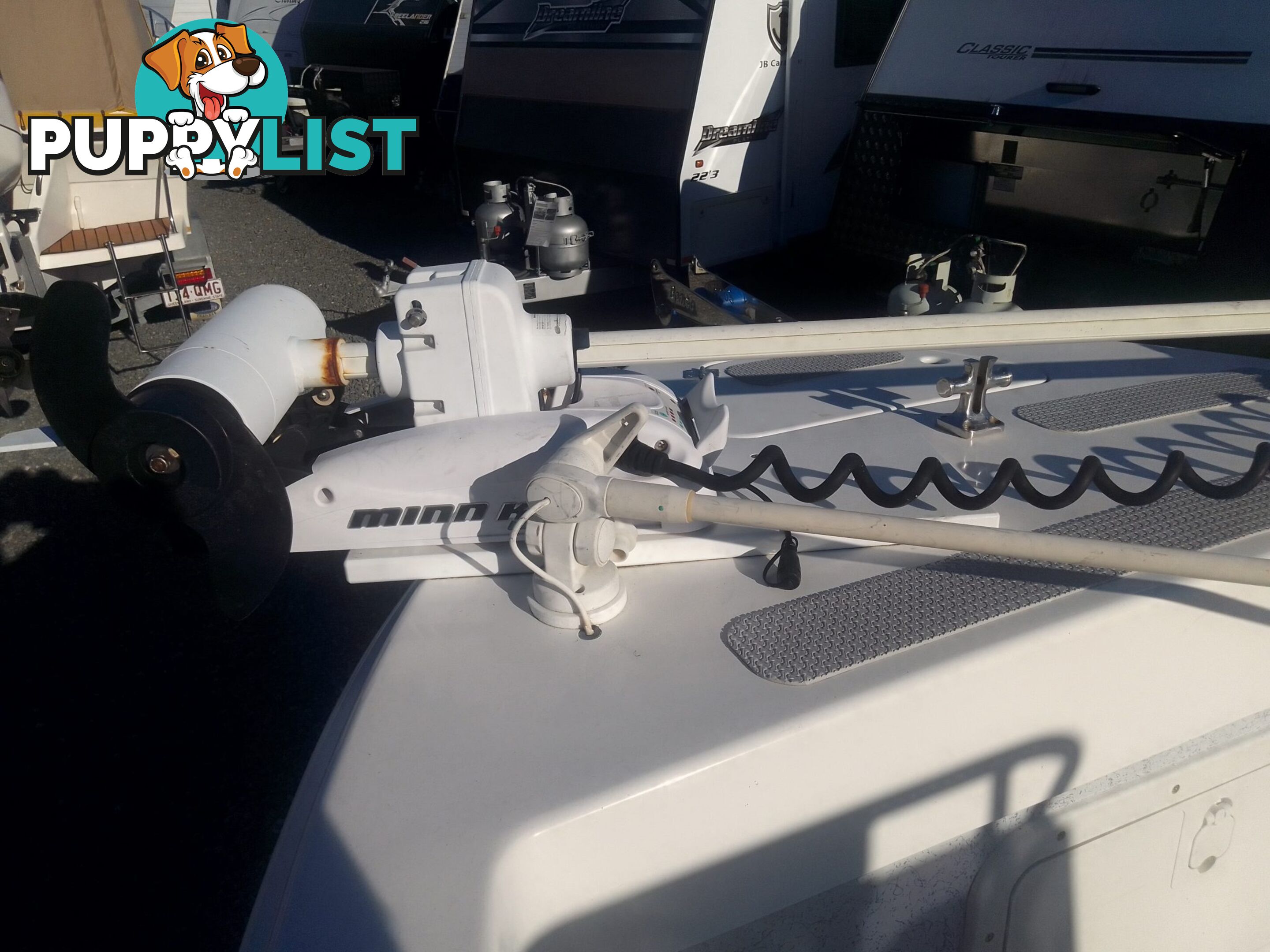 USED 2012 BONITO 560 CENTRE CONSOLE WITH A 2016 150HP EVINRUDE ETEC OUTBOARD ON A 2016 MAYFAIR MARINE DUAL AXLE TRAILER