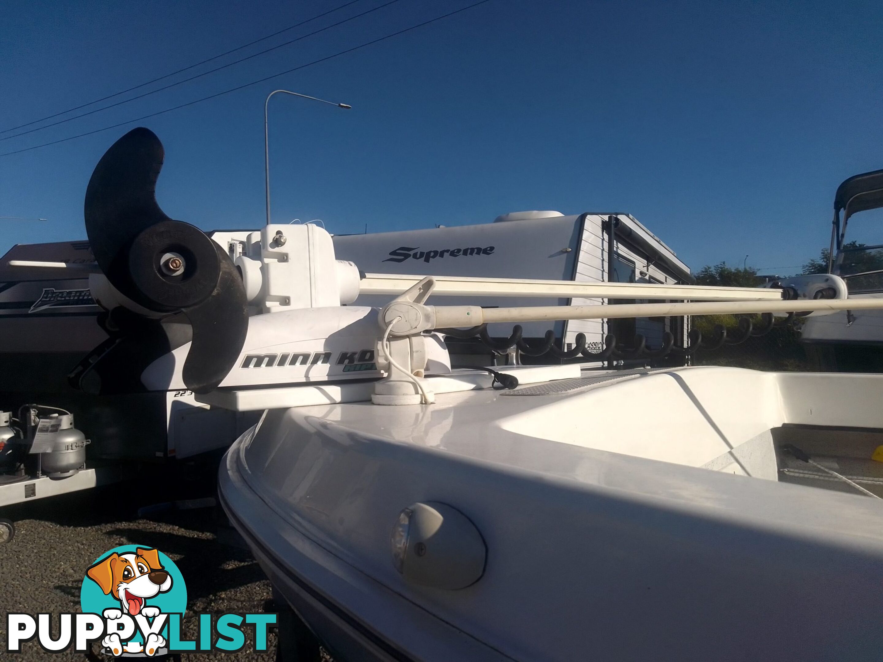 USED 2012 BONITO 560 CENTRE CONSOLE WITH A 2016 150HP EVINRUDE ETEC OUTBOARD ON A 2016 MAYFAIR MARINE DUAL AXLE TRAILER