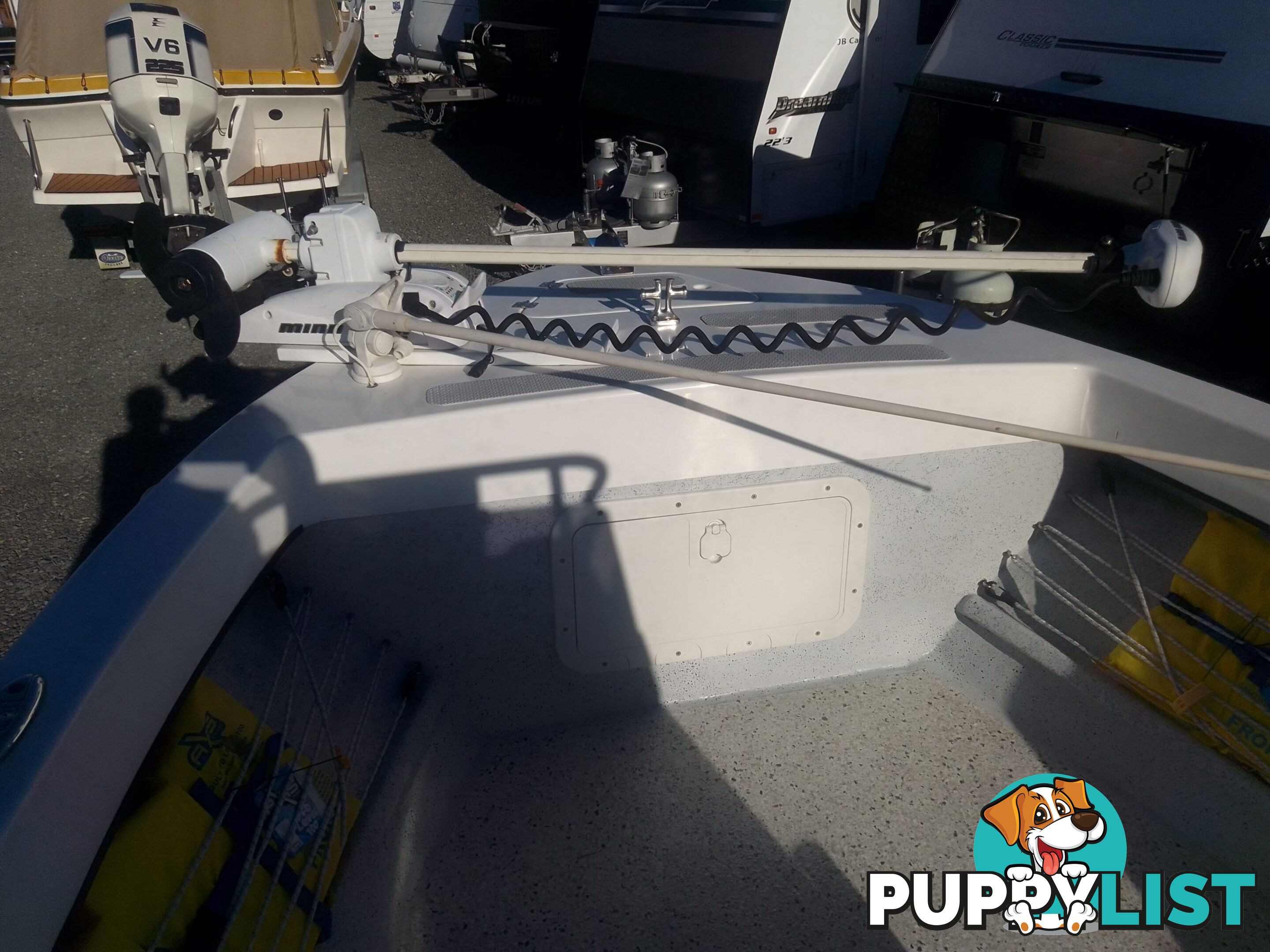 USED 2012 BONITO 560 CENTRE CONSOLE WITH A 2016 150HP EVINRUDE ETEC OUTBOARD ON A 2016 MAYFAIR MARINE DUAL AXLE TRAILER