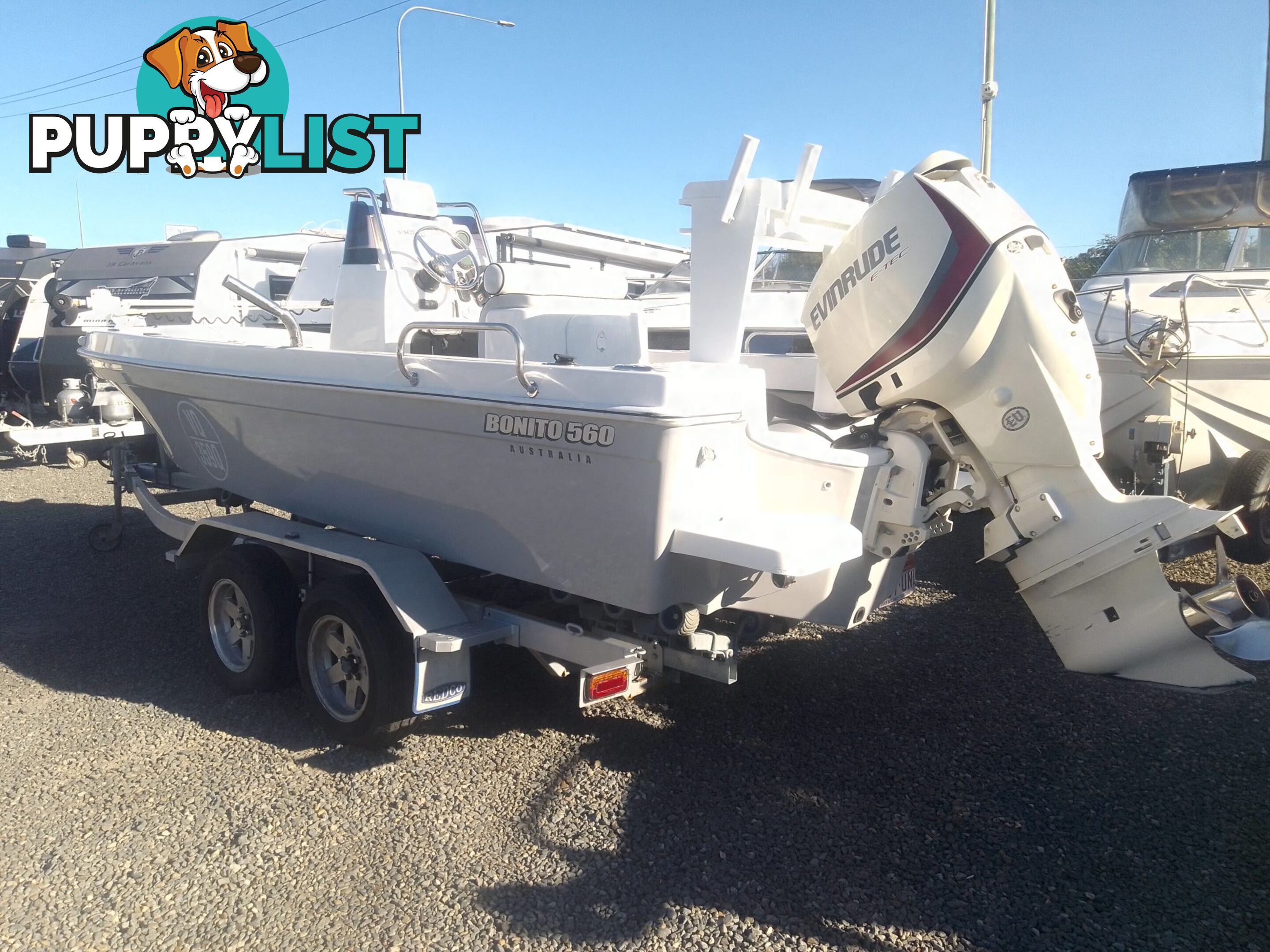 USED 2012 BONITO 560 CENTRE CONSOLE WITH A 2016 150HP EVINRUDE ETEC OUTBOARD ON A 2016 MAYFAIR MARINE DUAL AXLE TRAILER