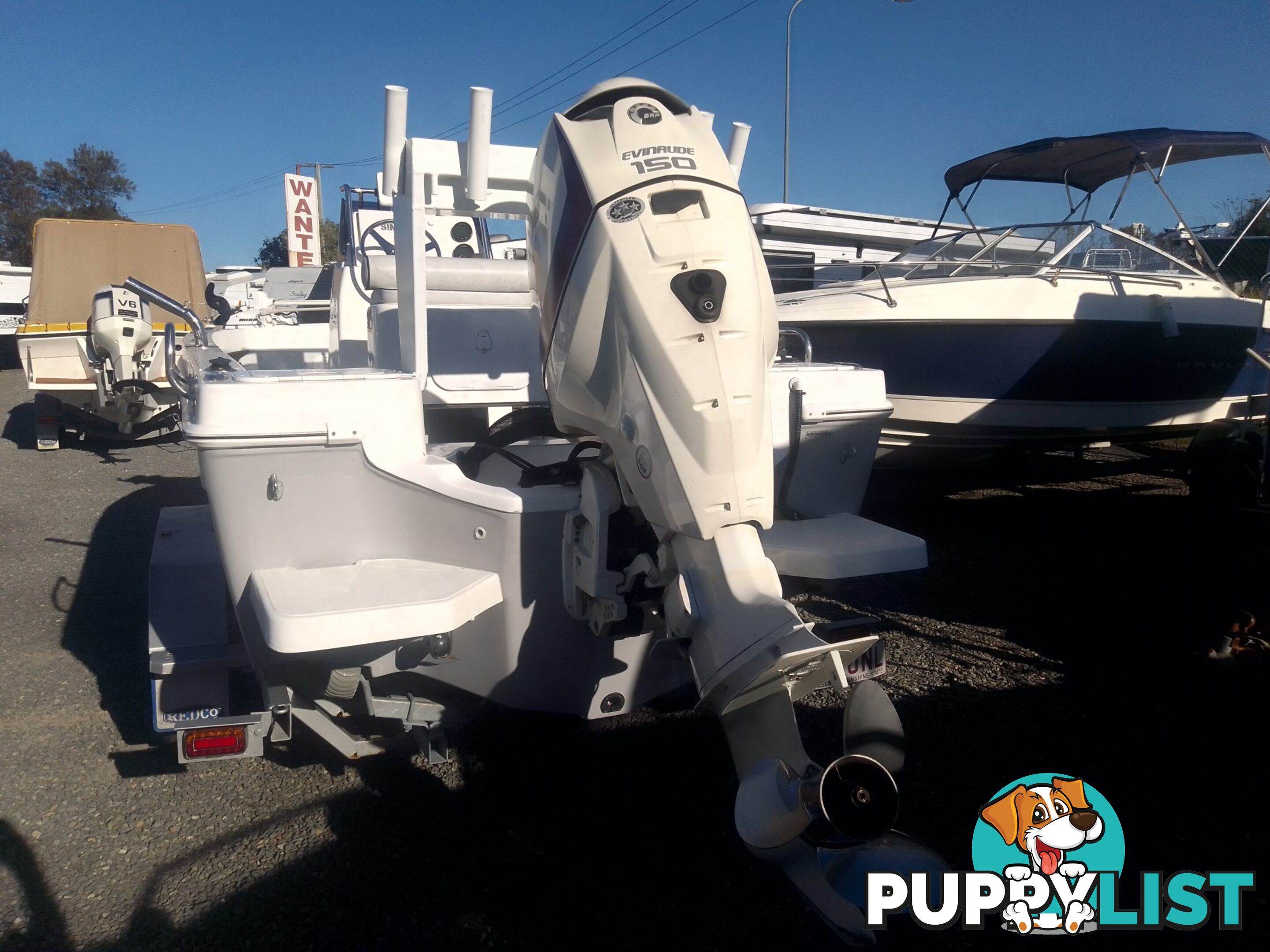 USED 2012 BONITO 560 CENTRE CONSOLE WITH A 2016 150HP EVINRUDE ETEC OUTBOARD ON A 2016 MAYFAIR MARINE DUAL AXLE TRAILER