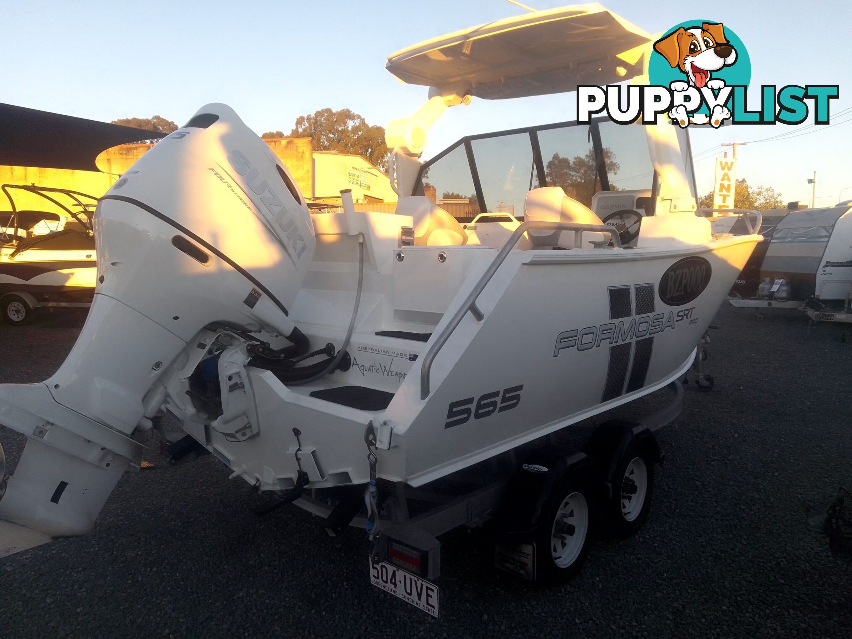 USED 2022 FORMOSA SRT PRO 565 CENTRE CONSOLE ON A 2022 DUNBIER DUAL AXLE TRAILER WITH A 2022 SUZUKI 4 STROKE 175HP OUTBOARD