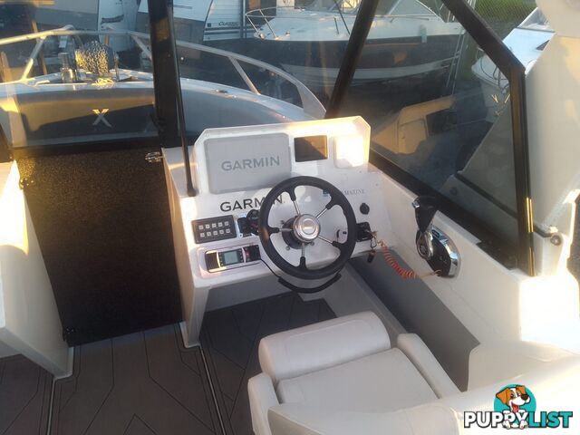 USED 2022 FORMOSA SRT PRO 565 CENTRE CONSOLE ON A 2022 DUNBIER DUAL AXLE TRAILER WITH A 2022 SUZUKI 4 STROKE 175HP OUTBOARD