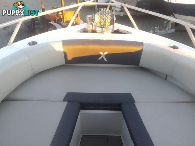 USED 2022 FORMOSA SRT PRO 565 CENTRE CONSOLE ON A 2022 DUNBIER DUAL AXLE TRAILER WITH A 2022 SUZUKI 4 STROKE 175HP OUTBOARD