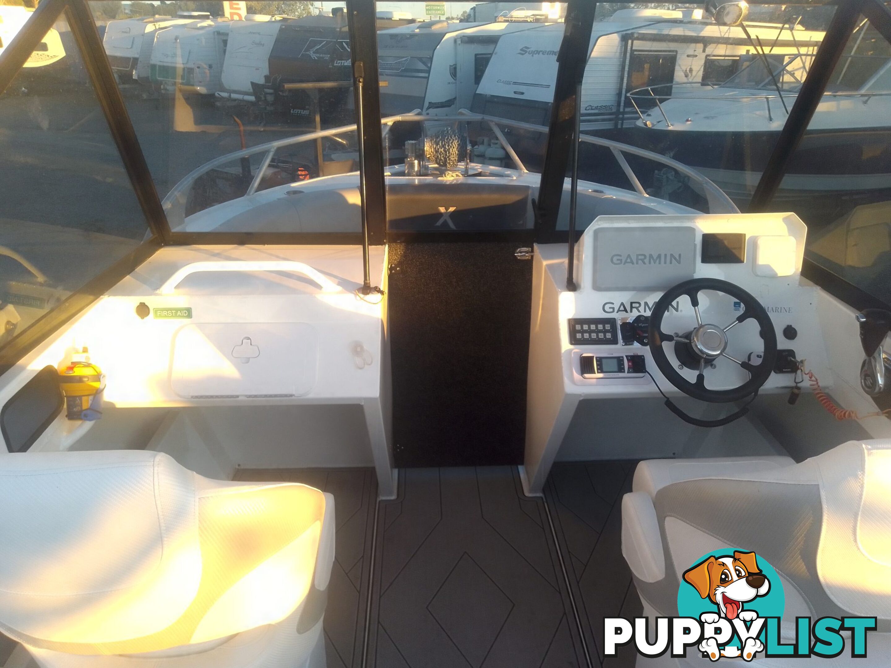 USED 2022 FORMOSA SRT PRO 565 CENTRE CONSOLE ON A 2022 DUNBIER DUAL AXLE TRAILER WITH A 2022 SUZUKI 4 STROKE 175HP OUTBOARD