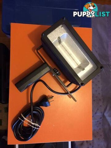 Powerful hand held studio light by UNOMAT in near new condition