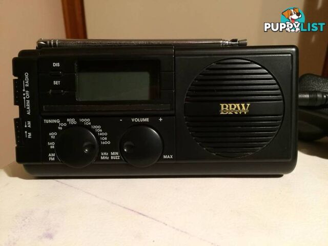 BRW HAND HELD PORTABLE AM/FM RADIO WITH A/C ADAPTOR