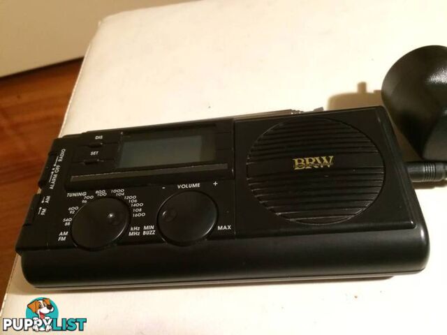 BRW HAND HELD PORTABLE AM/FM RADIO WITH A/C ADAPTOR