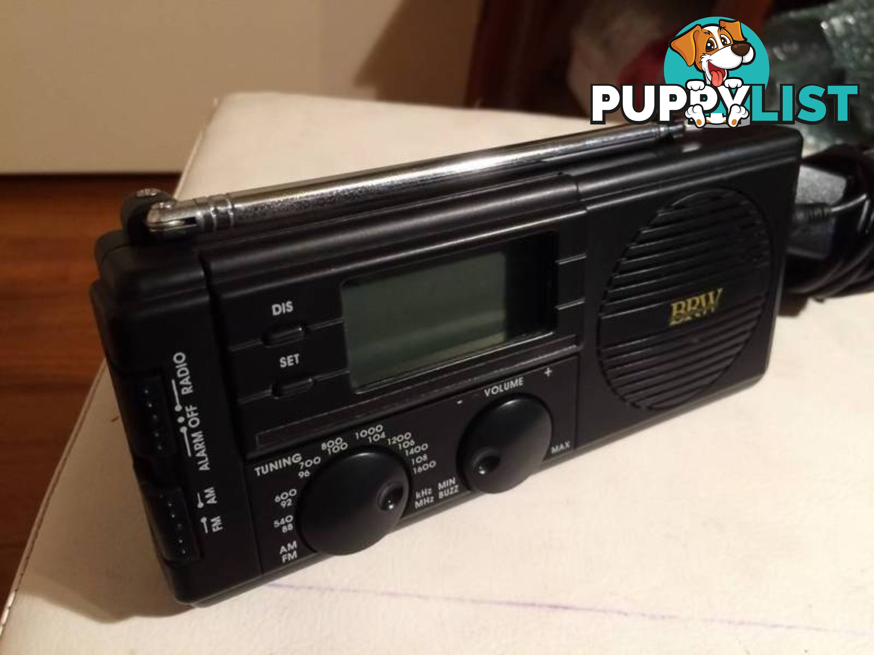 BRW HAND HELD PORTABLE AM/FM RADIO WITH A/C ADAPTOR