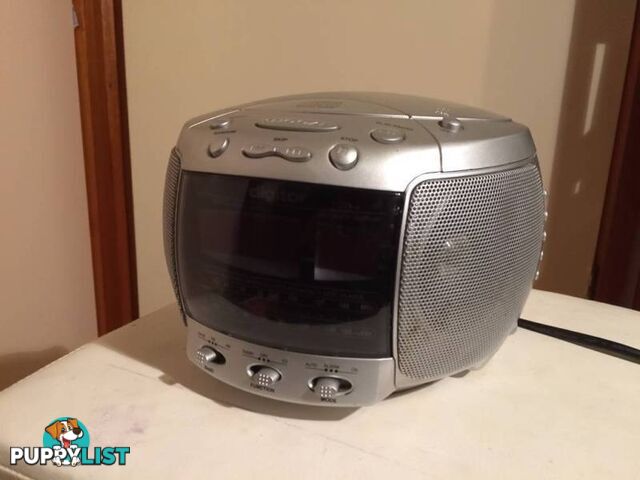 DIGITOR COMPACT DISC STEREO CLOCK RADIO IN WORKING CONDITION