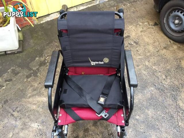 WHEELCHAIR IN GREAT CONDITION WITH SEATBEALT & ARM LIFTS