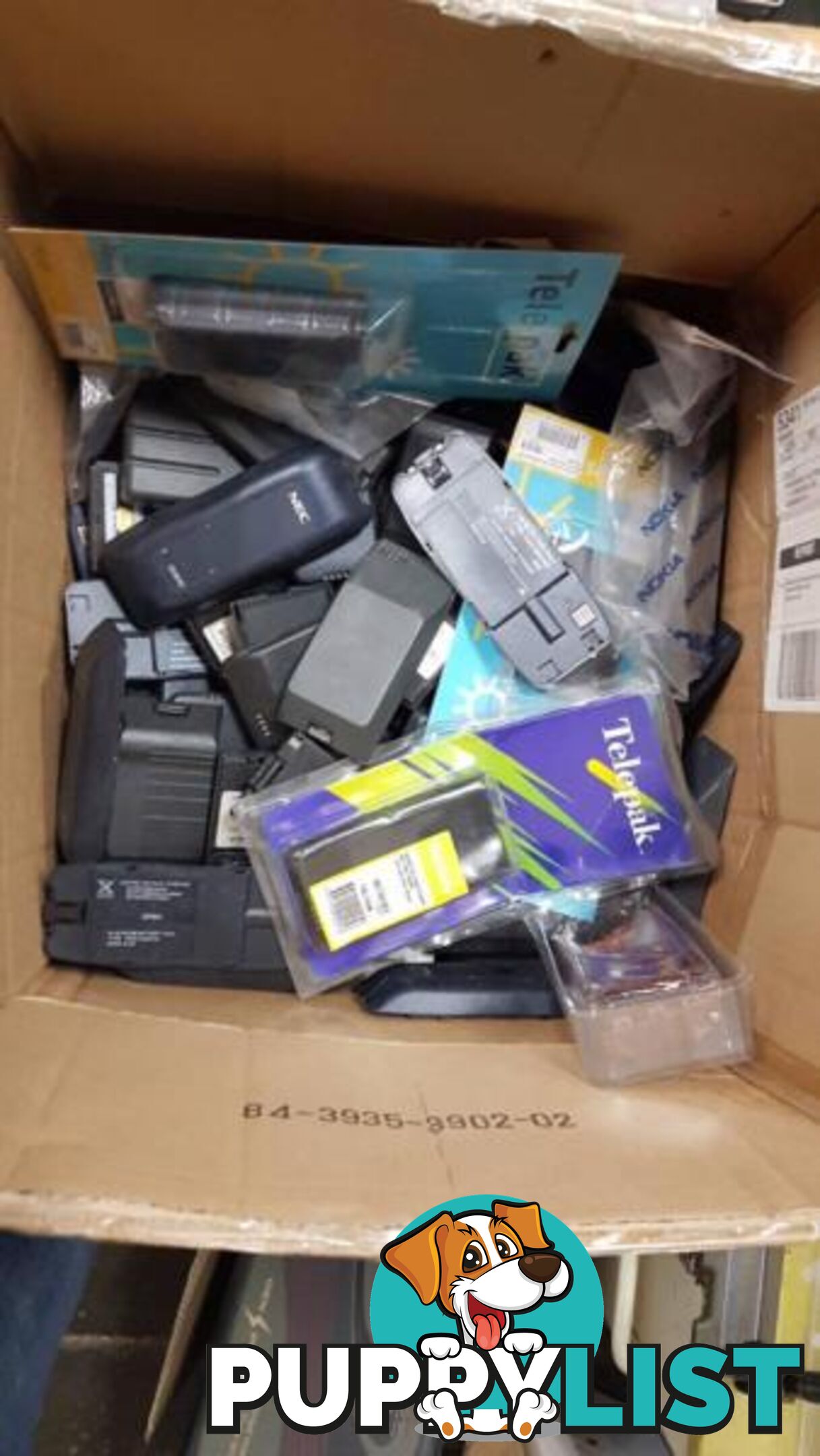 Box of Miscellaneous Phone Batteries