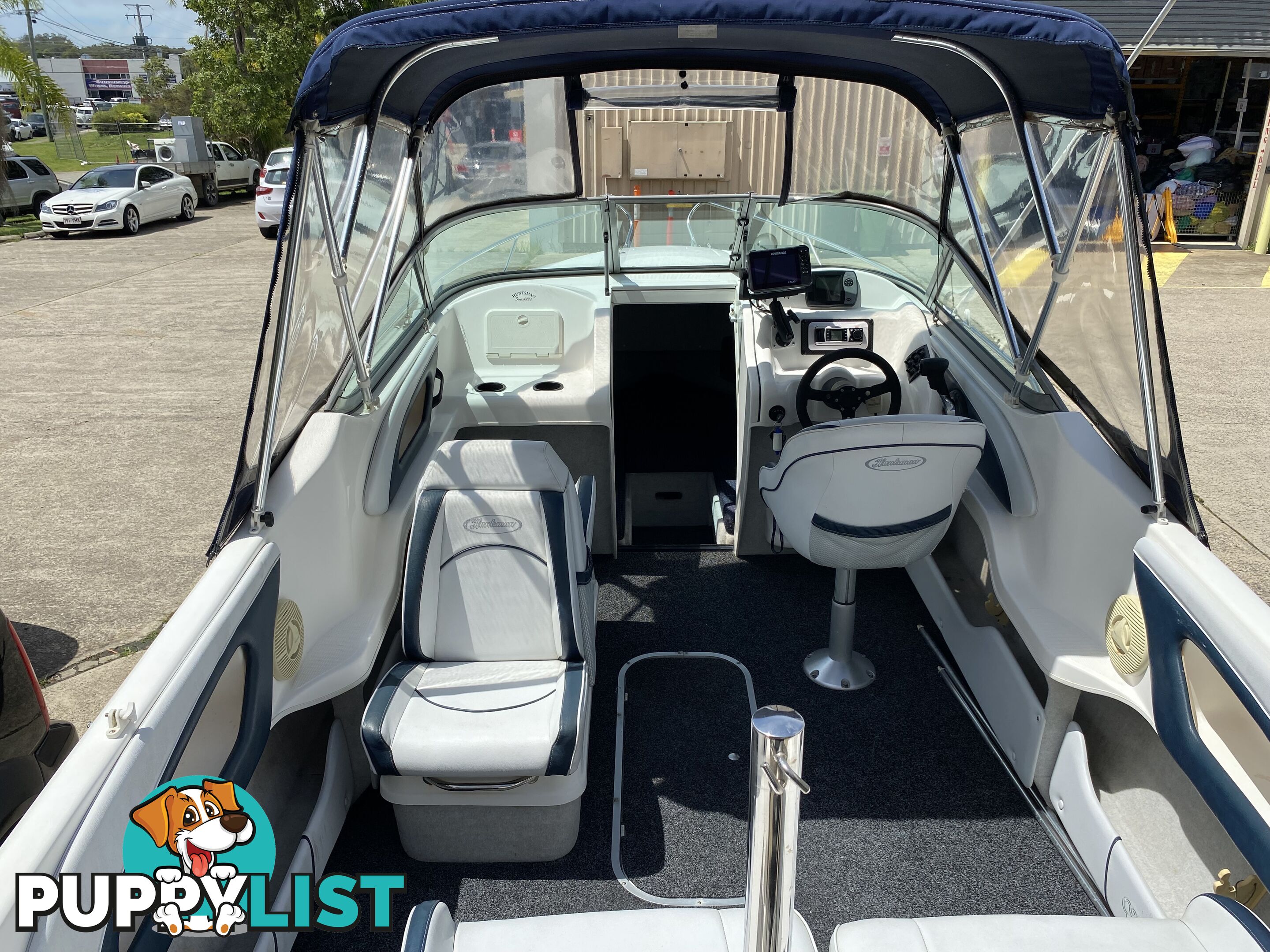 2004 Huntsman 6000 Series Half Cabin