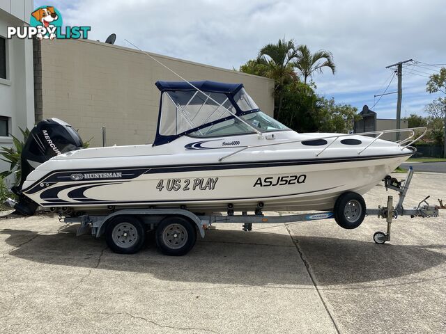 2004 Huntsman 6000 Series Half Cabin