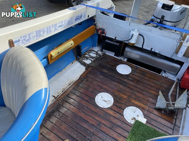 5m Seafarer cuddy cabin powered by 60hp Honda fuel injected four stroke  