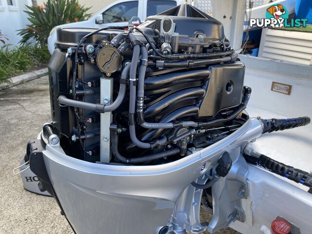 5m Seafarer cuddy cabin powered by 60hp Honda fuel injected four stroke  
