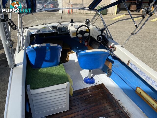 5m Seafarer cuddy cabin powered by 60hp Honda fuel injected four stroke  