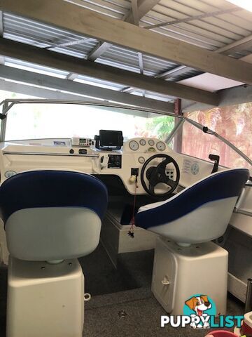 1996 Seafearer powered by Evinrude on trailer 