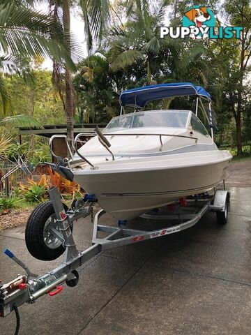 1996 Seafearer powered by Evinrude on trailer 