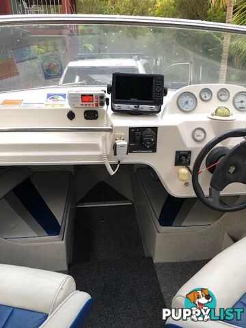 1996 Seafearer powered by Evinrude on trailer 