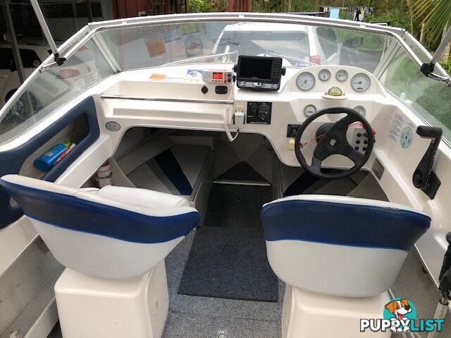 1996 Seafearer powered by Evinrude on trailer 