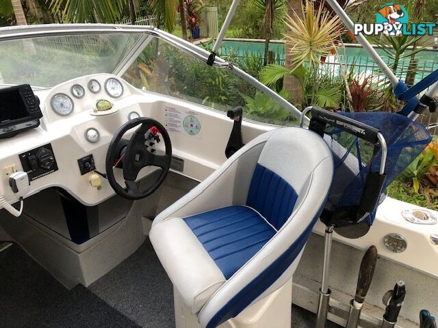 1996 Seafearer powered by Evinrude on trailer 