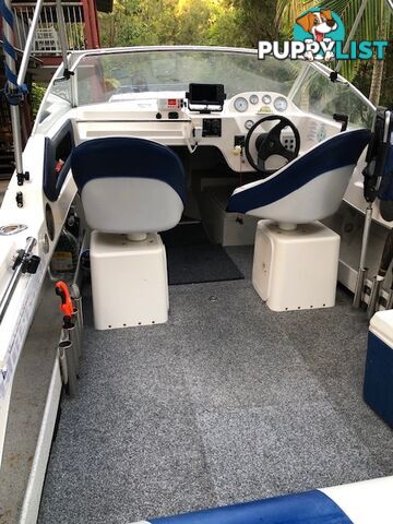 1996 Seafearer powered by Evinrude on trailer 