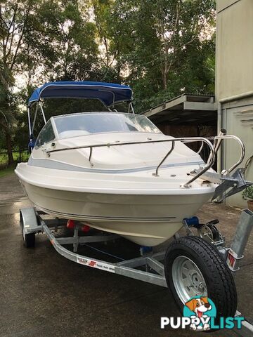 1996 Seafearer powered by Evinrude on trailer 