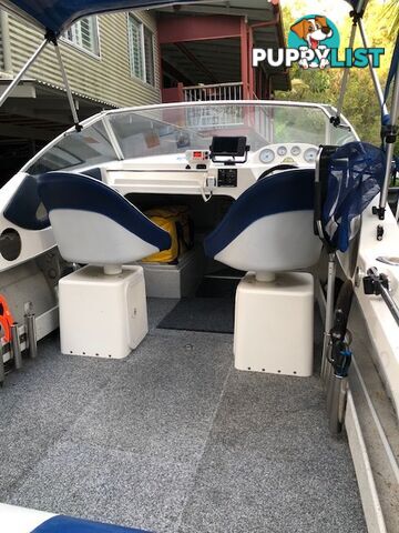 1996 Seafearer powered by Evinrude on trailer 