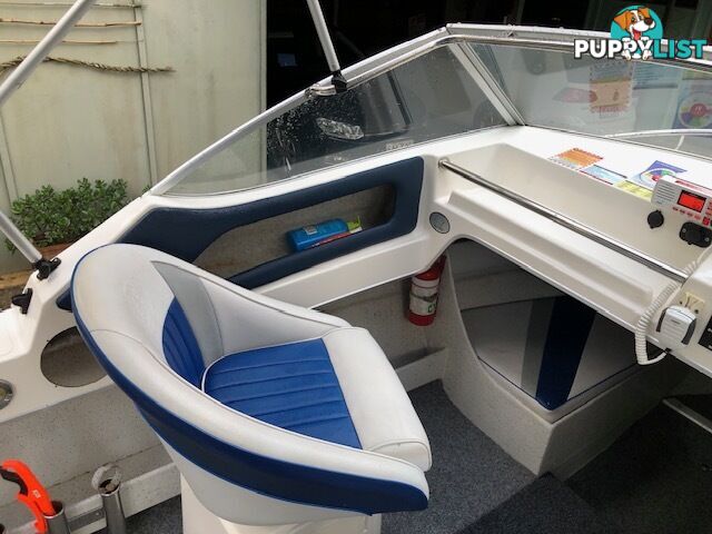 1996 Seafearer powered by Evinrude on trailer 