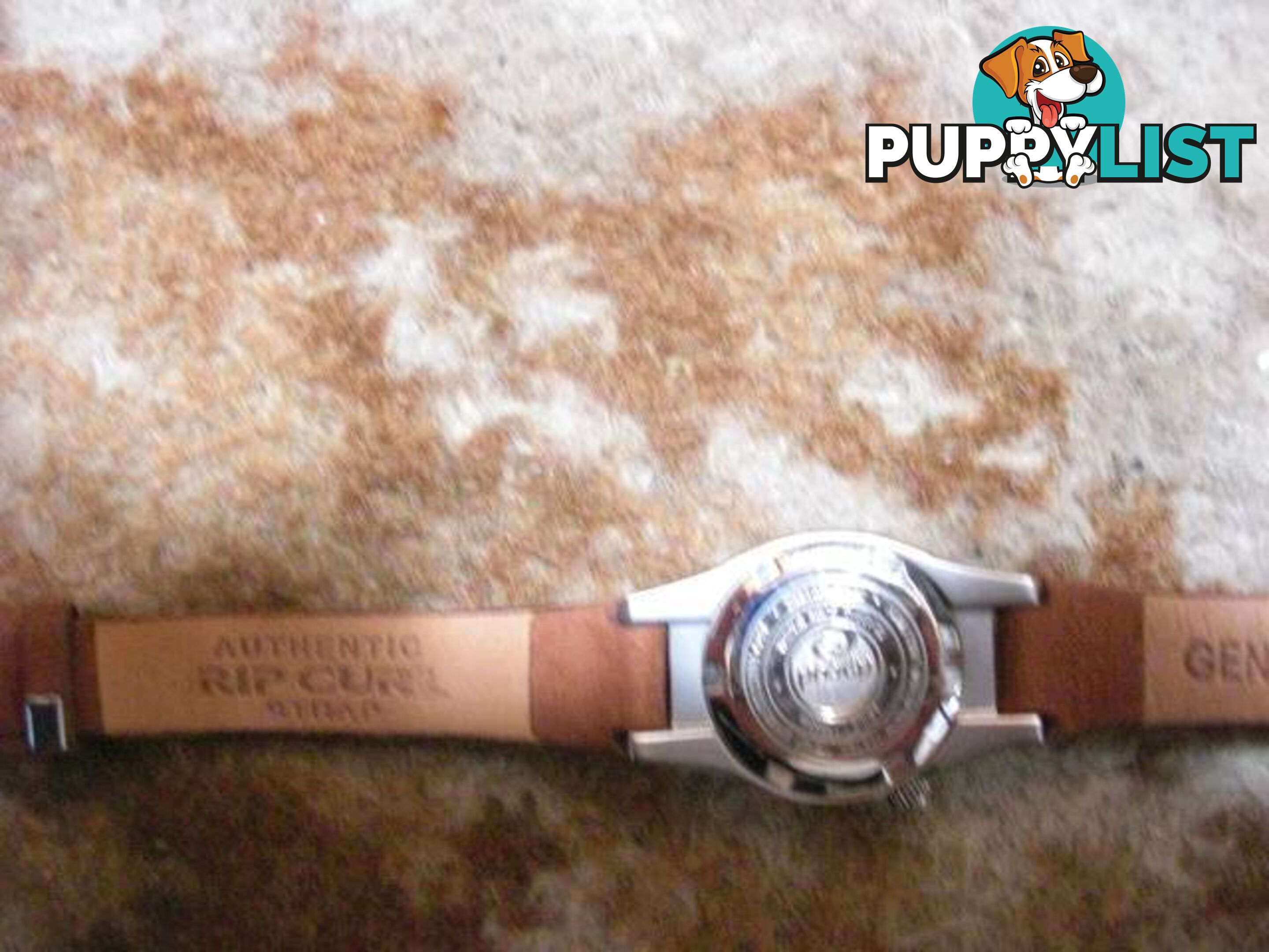 RIPCURL WATCH UNWANTED GIFT NEVER WORN WATERPROOF PICKUP OR POSTA